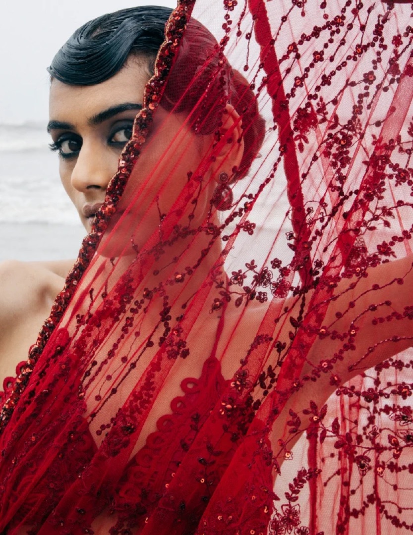Beaded vines on crimson tulle — cutdana set thread by thread